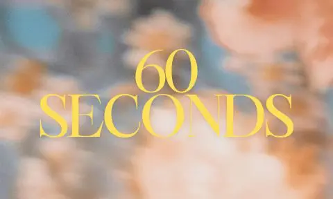 A blurry picture of the word 6 0 seconds.